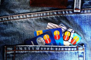 MasterCard cards in a pocket investing in blockchain technology